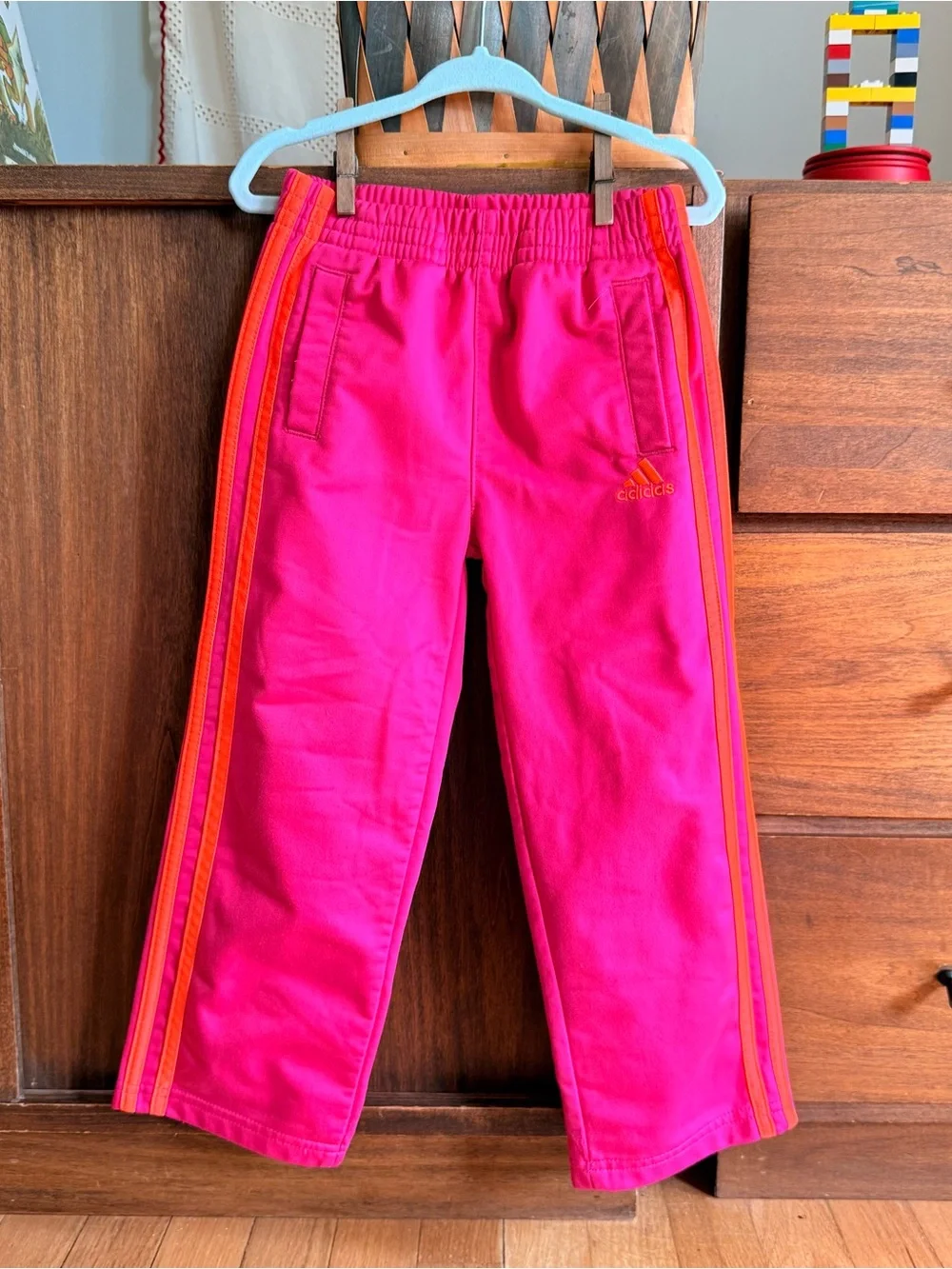 adidas Kids Bright Pink Lined Joggers with Orange Side Stripes